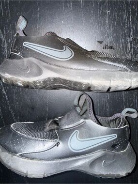 Nike Kids Black Slip-On Sneakers with Gray Swoosh